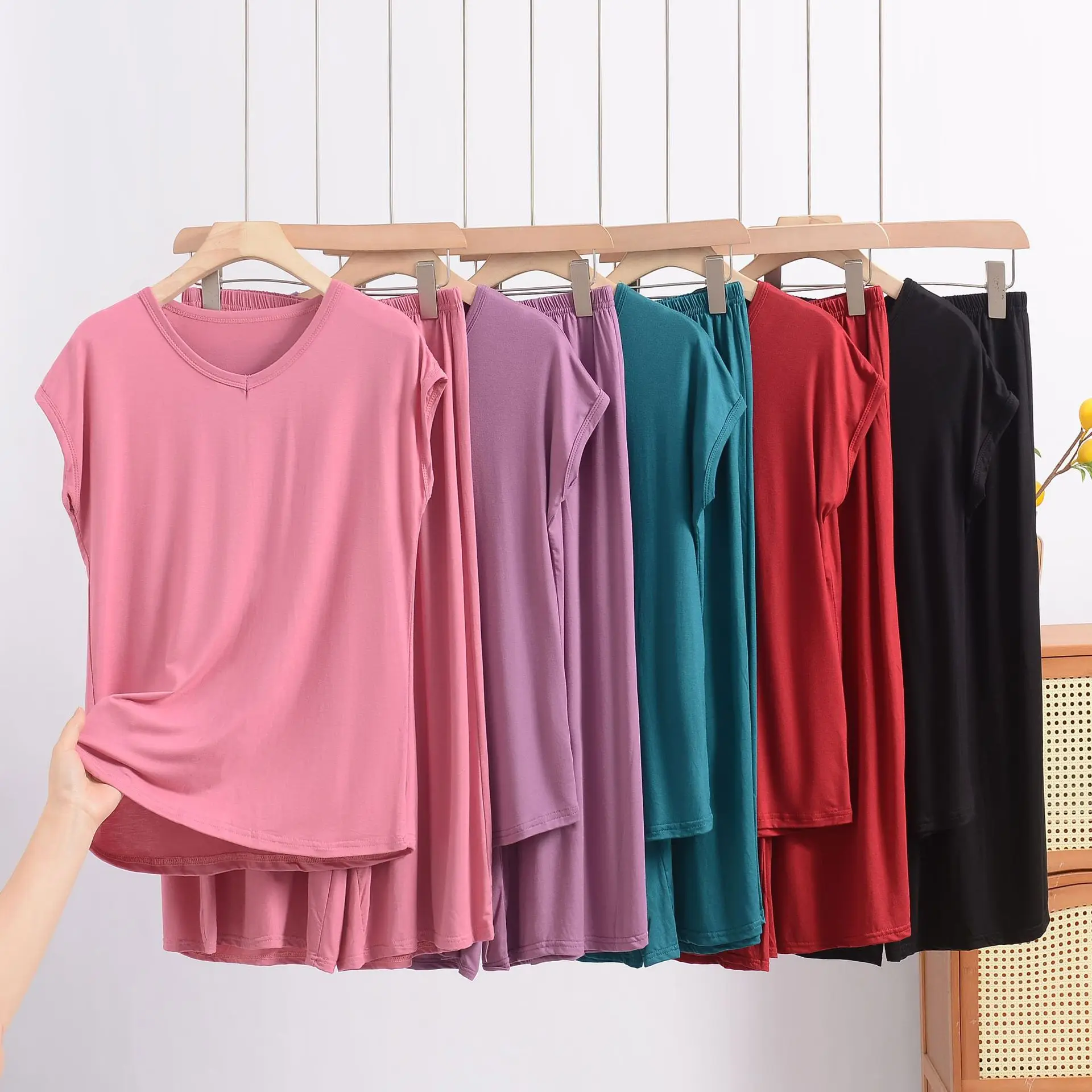 

XL to 8XL Plus size Modal Pajamas sets Loose Short sleeve Tshirts and calf length pants Solid color Loose Homewear 2pcs suits