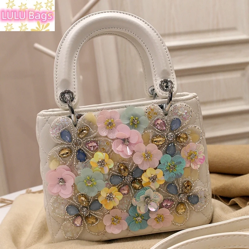 spring new fashion women's bag niche fashion foreign heavy industry flowers hand bill of lading shoulder crossbody small bag