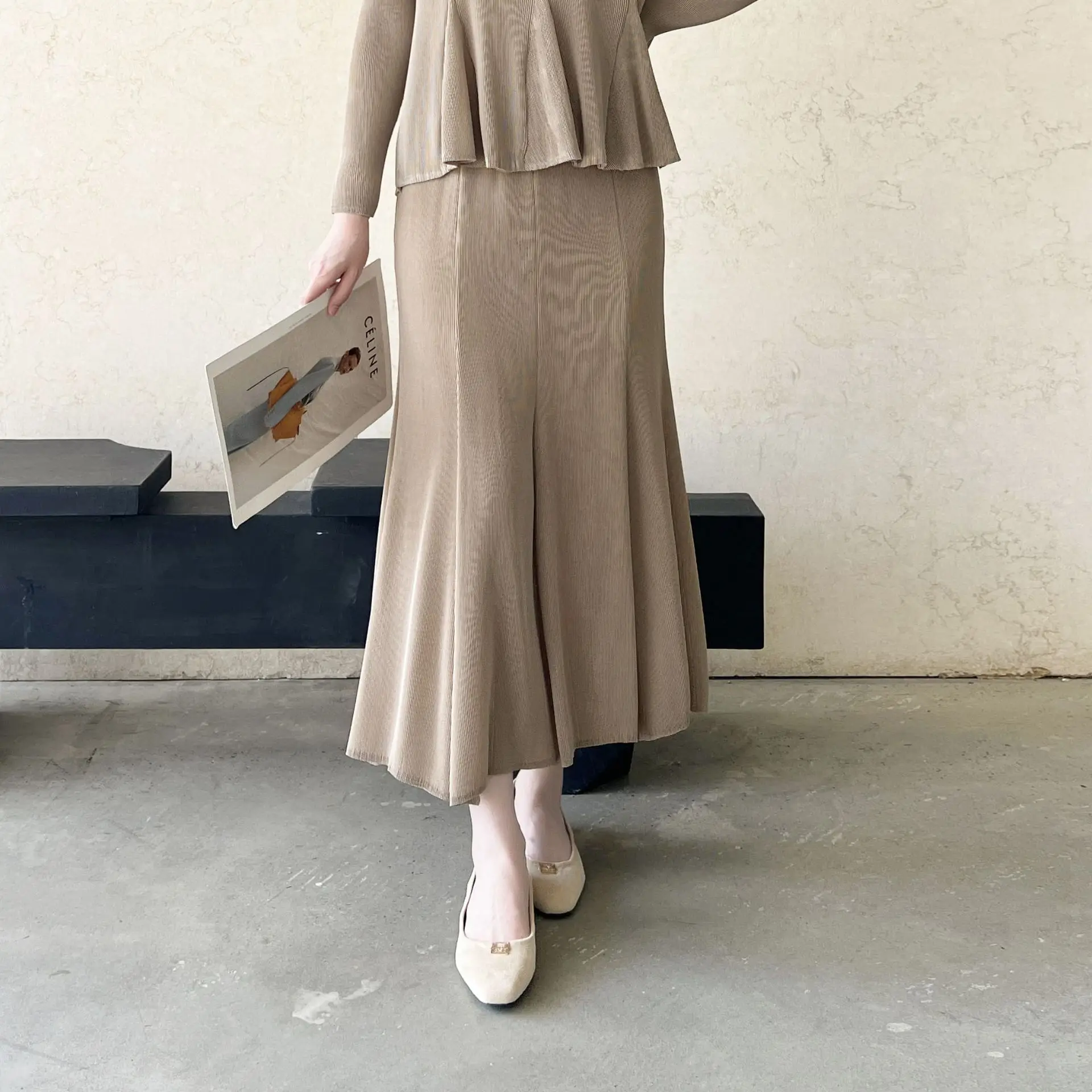 Miyake plisado 2026 otoño y primavera nueva ropa plisada de alta gama viajero cien con paquete falda de medio cuerpo de cola de pez a la cadera