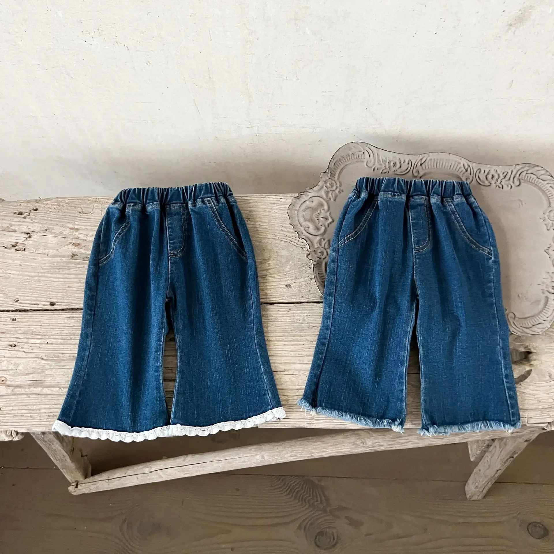 Vestiti del bambino tinta unita semplice pizzo Denim Flare pantaloni 2024 primavera e autunno nuove ragazze moda bambino Casual tutti i Jeans abbinati