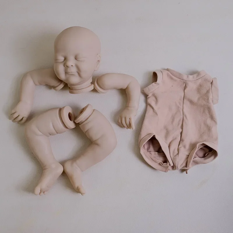 Zestaw dla lalek Reborn NPK 19'' Olivia, niezamalowana, świeży kolor, z tkaninowym ciałem i oczami, wysokiej jakości części do samodzielnego wykonania lalek.