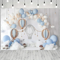 1 hot air balloon photo background, showing clouds and the sky, suitable for party photography banners