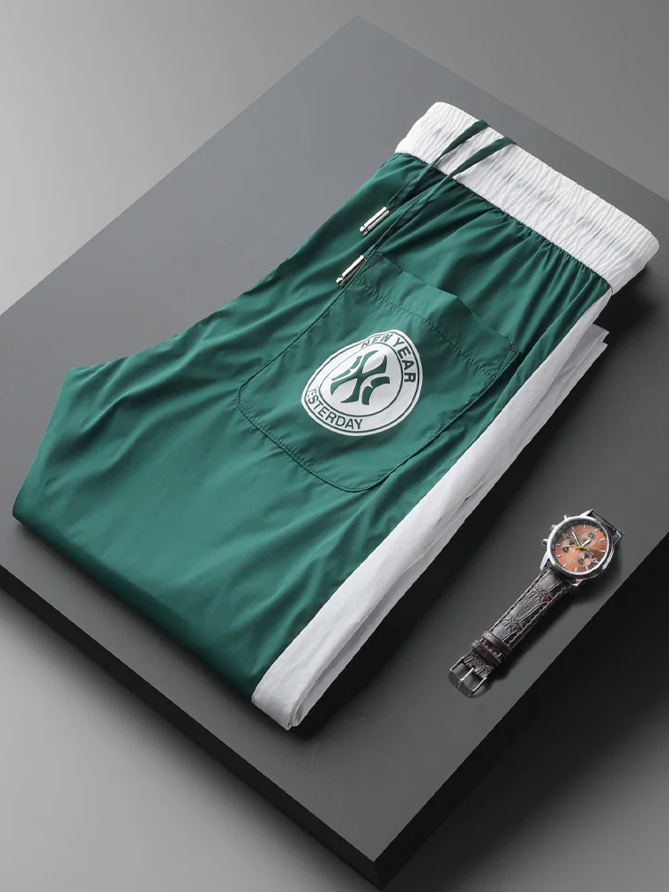 

Summer Ice Silk Qui Dry Pants Men's Slim Fit Sports Trousers Smooth Elastic Waist Low Elastici Nine Points Pants