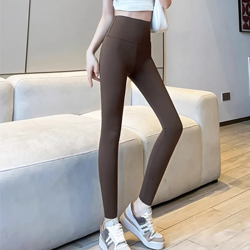 กางเกงโยคะเอวสูงสำหรับผู้หญิง รุ่นฤดูใบไม้ร่วง ผ้ารัดรูป ดีไซน์กระชับสัดส่วน ยกกระชับสะโพก ความยาวเก้าส่วน สไตล์ลำลอง