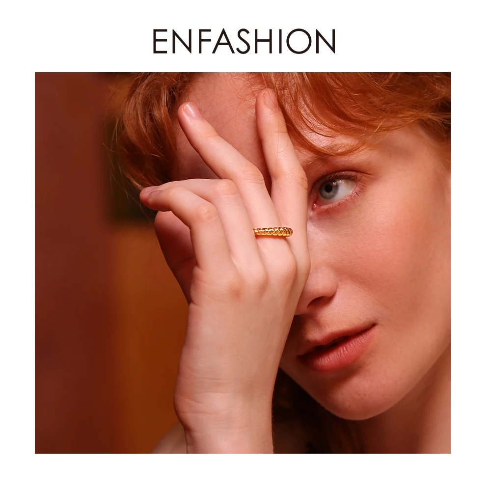 

Enfashion Pure Form Twist Rings For Women Gifts Gold Color Brass Wave Men Ring Fashion Jewelry Bague Anillo Jewellery RF184005