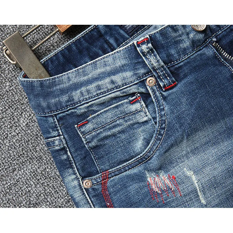 Fashionable street clothing men's stretch jeans retro blue slim fit distressed jeans men's embroidery designer retro denim pants