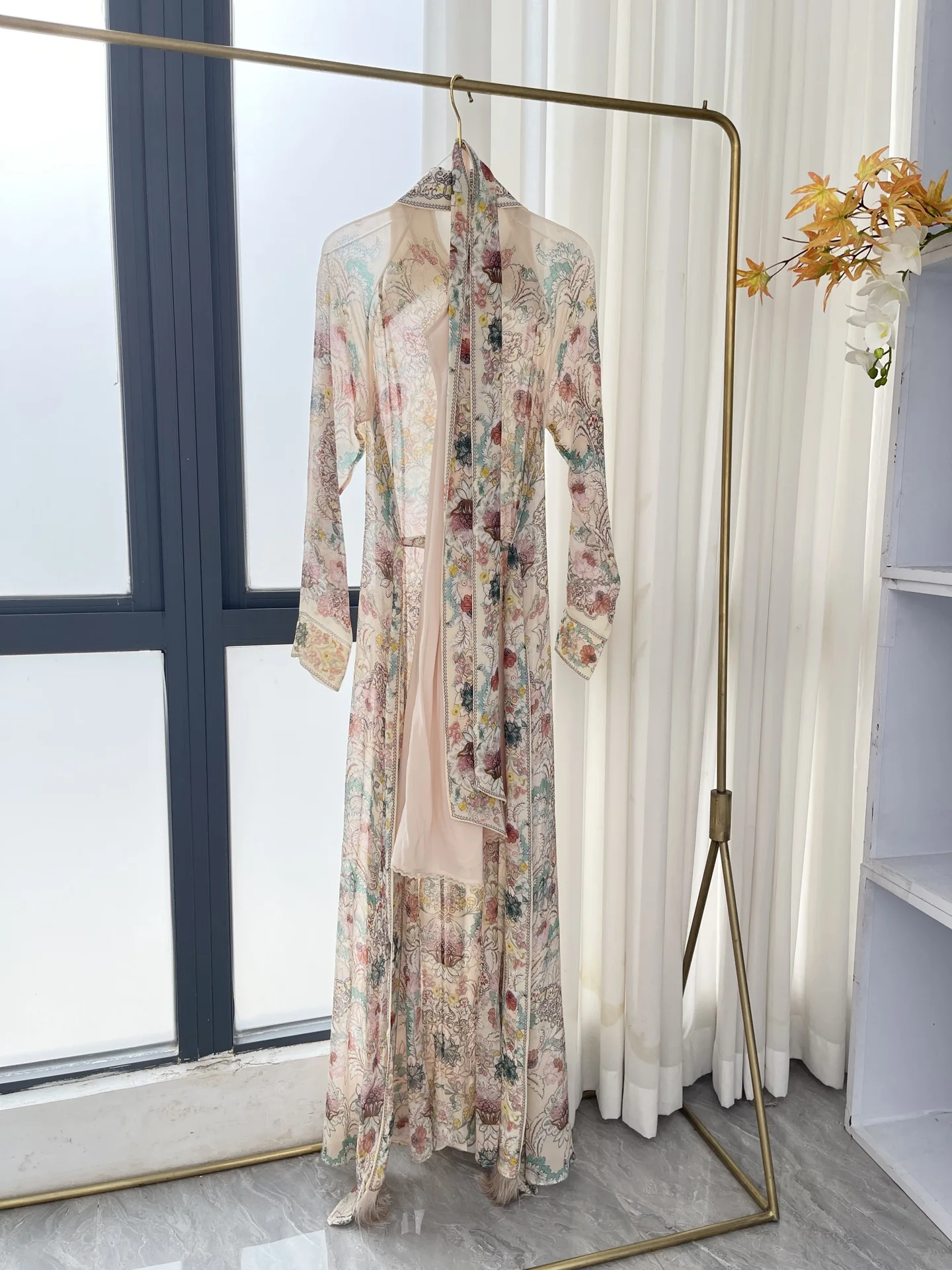 

Beige Floral Print Long Sleeve Tassel Maxi Dress