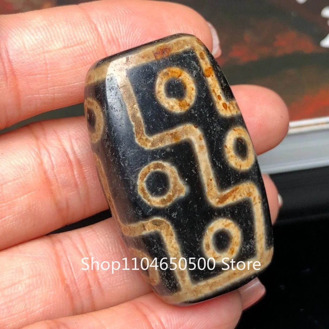 Special offer Tibetan area reflux old material high oil pulp sub-yellow [twelve eyes dzi beads] Size: 45 * 28 * 14mm