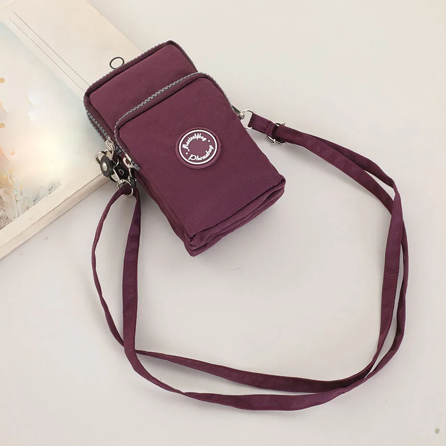 حقيبة كروس نسائية عصرية محمولة بسحاب ثلاثي من النايلون بلون سادة للجري اليومي ومتينة وعالية الجودة للهاتف الخلوي