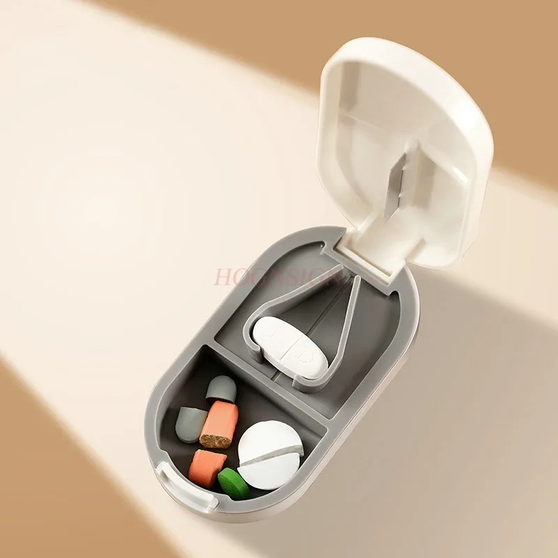 Medicine box cutter, portable medicine storage box, divided into one and two pill dividers