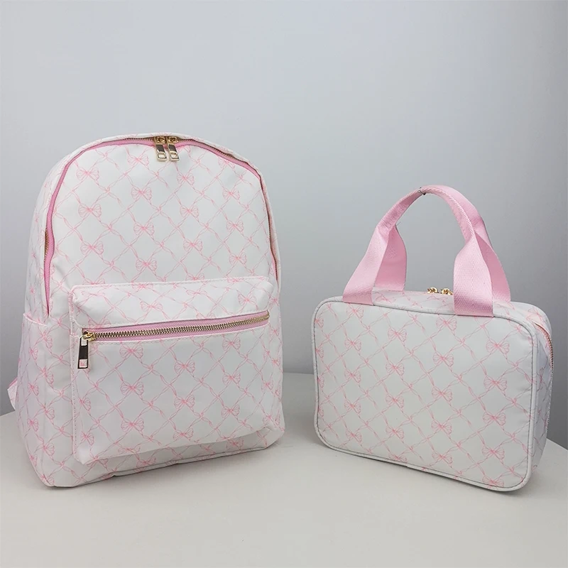 2024 nuovo Design griglia fiocco stampato zaino per studenti Nylon impermeabile rosa blu zainetto zaini da viaggio per ragazze adolescenti donne