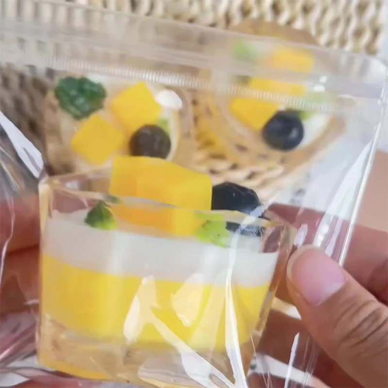 Idea de regalo para niña: Taza de té de la leche de sandía/mango de una pieza, juguete divertido de postre de imitación de TPR suave