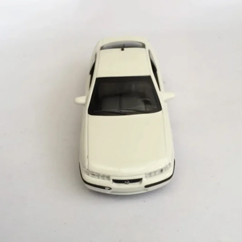 1:43 Scale 1995 Opel Calibra Alloy Sports Car Model -No Color Box Adult Children Collection Decoration Gift Toys Static Display