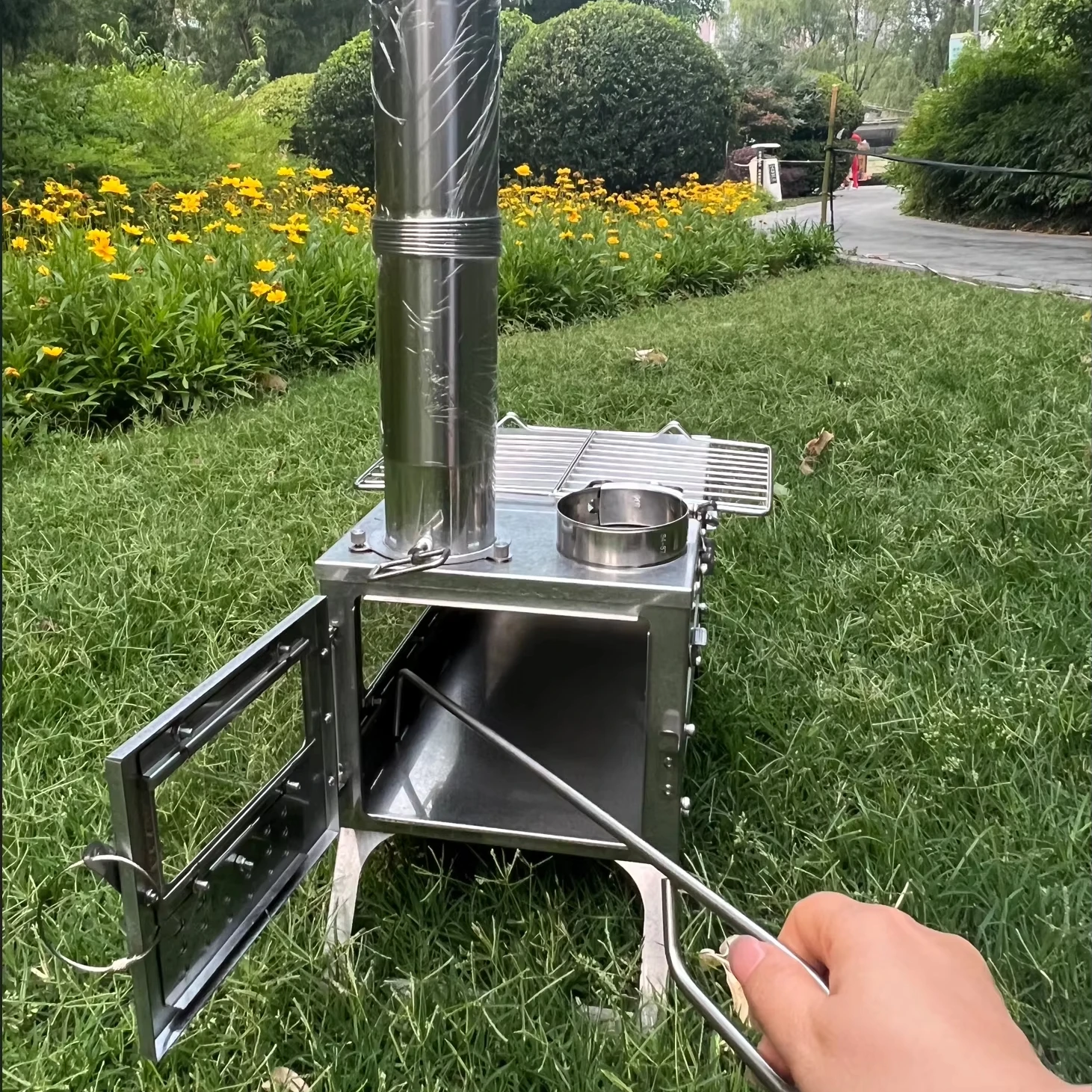 Estufa de leña desmontable plegable portátil de acero inoxidable para tienda de campaña, precio de fábrica, producto de cocina