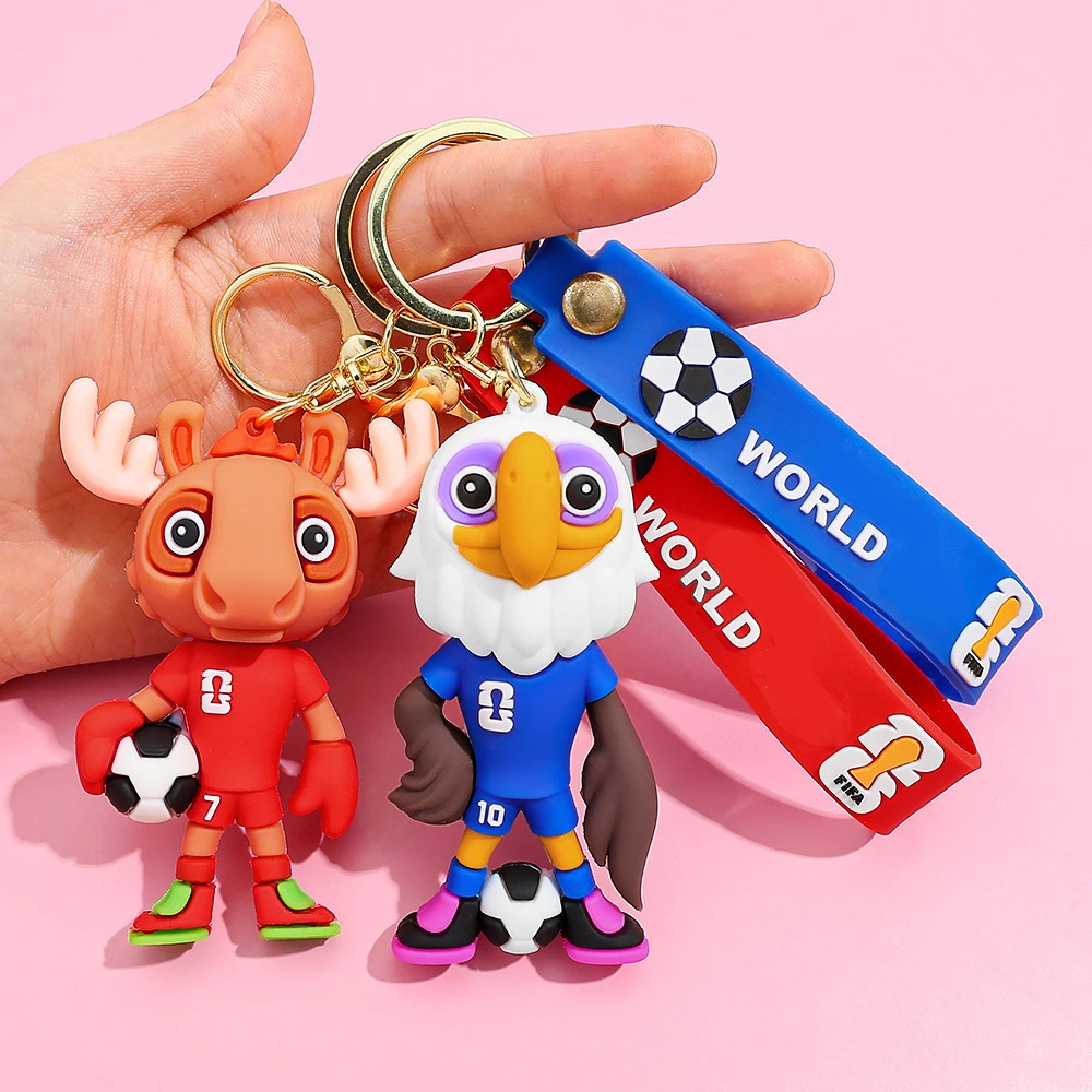 2026 Nuovo calcio IP mascotte squadra di calcio figura in PVC borsa fascino partita di calcio portachiavi souvenir per bambini e fan di Natale