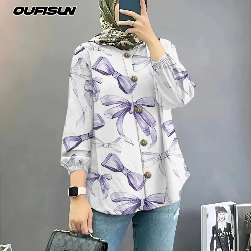 เสื้อเชิ้ตมุสลิมขนาดใหญ่พร้อมผูกรูปผีเสื้อเสื้อเชิ้ตแขนยาวสไตล์หวานแขนพัฟราคาถูก 2025 เสื้อฤดูร้อน