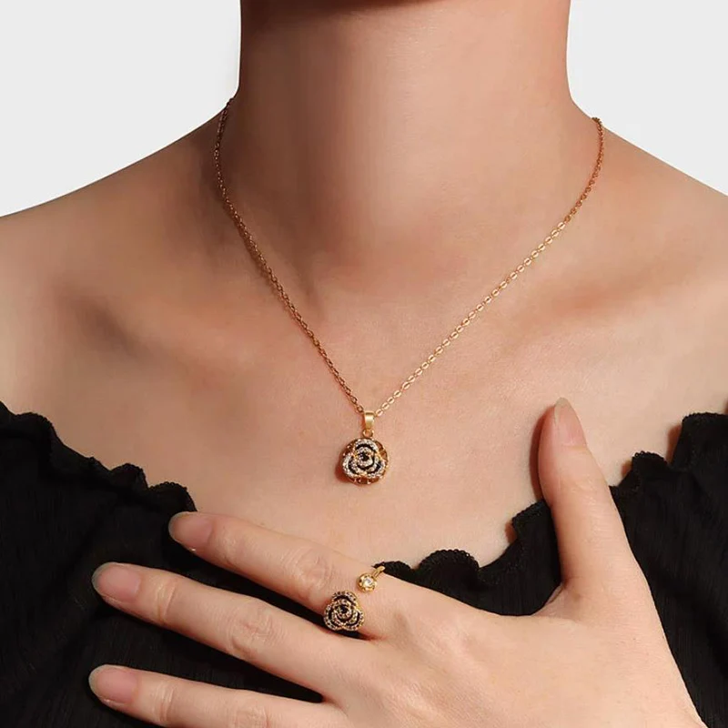 Korean Hot Selling Black Drip Oil Camellia Rotating Ring Temperament and Niche Design Collarbone Chain for Women KOFSAC