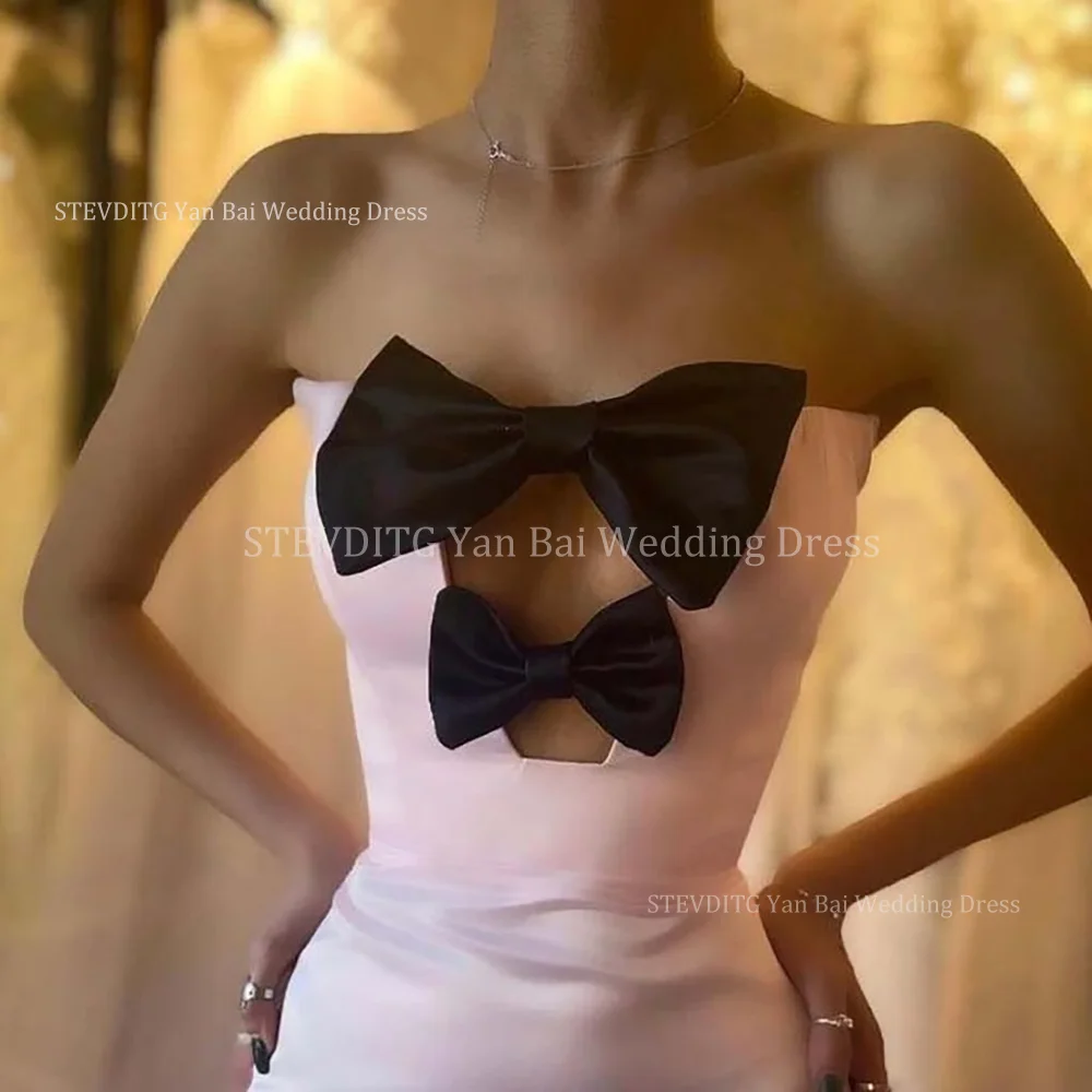 Abiti da ballo in raso rosa senza spalline senza maniche con fiocco nero alla caviglia abito a sirena sottile abito da sera formale da donna elegante