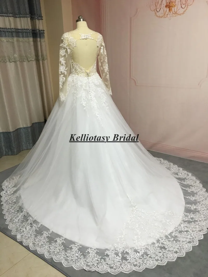 Vestido de novia hecho a medida con manga larga, vestidos de novia de tren largo con espalda con agujero