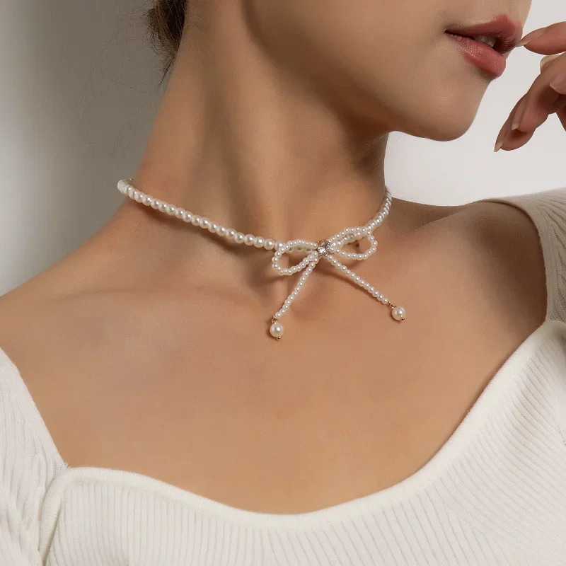 Collar elegante con lazo de perlas de imitación para mujer, gargantilla con lazo de perlas de imitación simples, collar con borlas geométricas estéticas