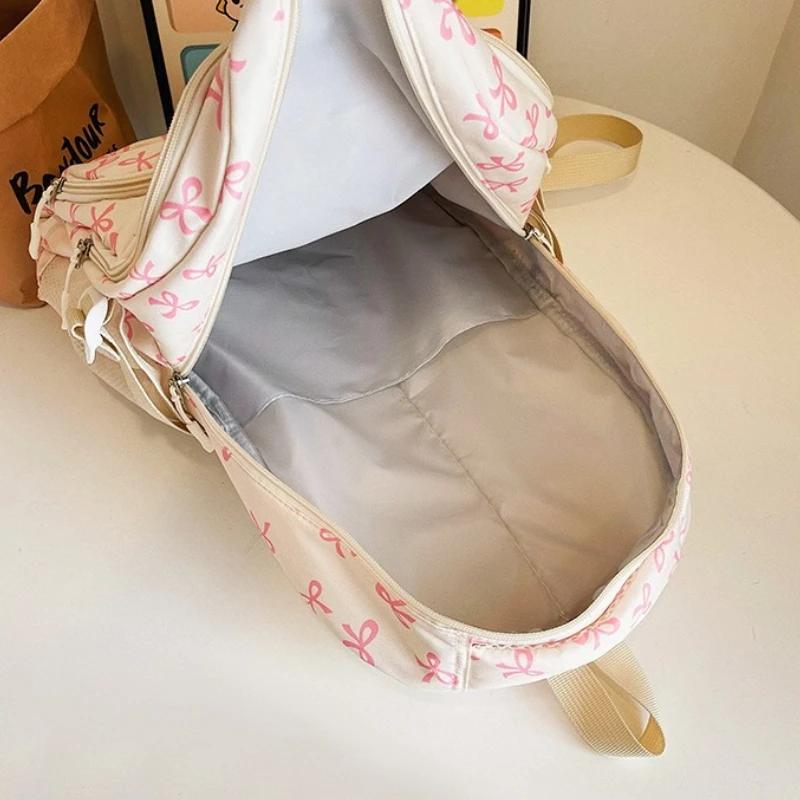 طقم نسائي جديد مكون من 3 قطع لعام 2025، طراز كوري، حقيبة ظهر عصرية للسفر بطباعة فيونكة، حقيبة مدرسية خفيفة الوزن وبسيطة للطلاب #6