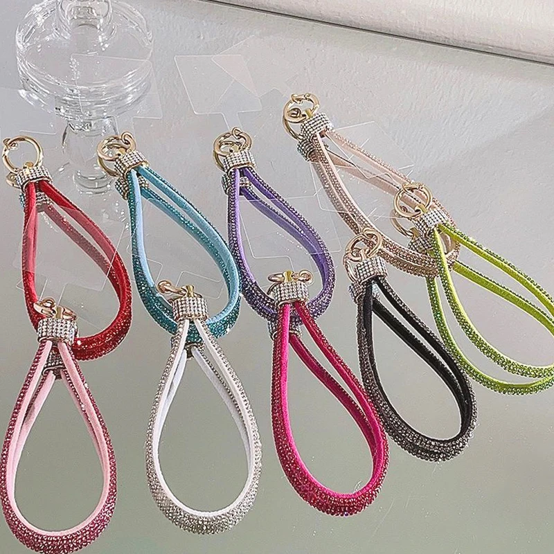Handy-Handgelenkschlaufe Luxuriöses Strass-Schlüsselband Armband Verstärkter Handy-Anhänger für iPhone Pro Samsung Xiaomi