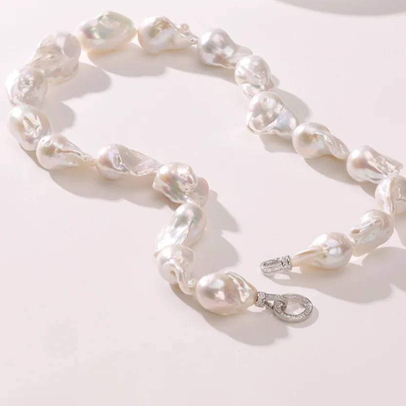 

RARE SOUTH SEA WHITE BAROQUE PEARL NECKLACE 17"22-35MM