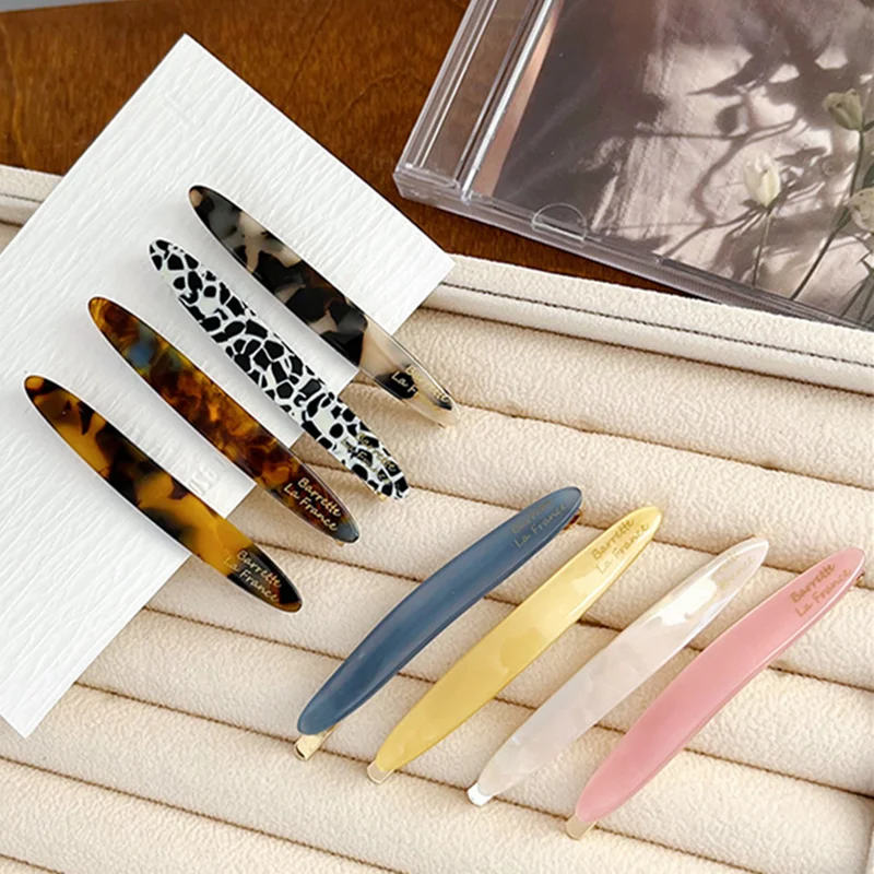 

Luxury Gold Stamp Barrettes, Featherlight Cellulose Acetate Angled Grip Technology for Slicked-Back Hairstyles