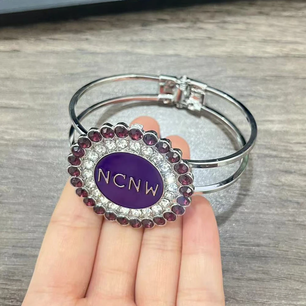 NCNW logo purple circular adjustable bracelet