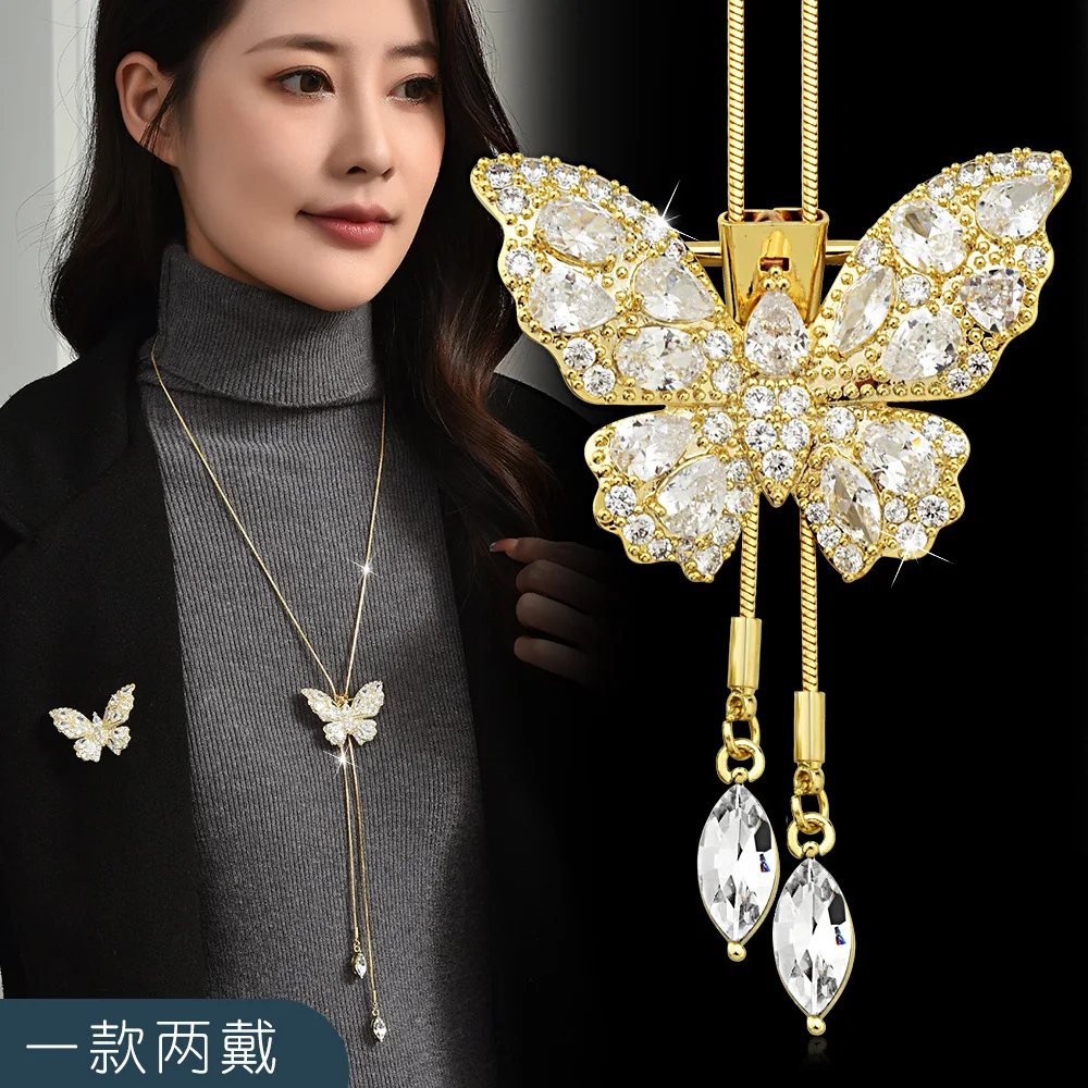 これはクリスタルバタフライロングネックレス、女性用の高級バタフライセーターチェーン、ネックレスです。
