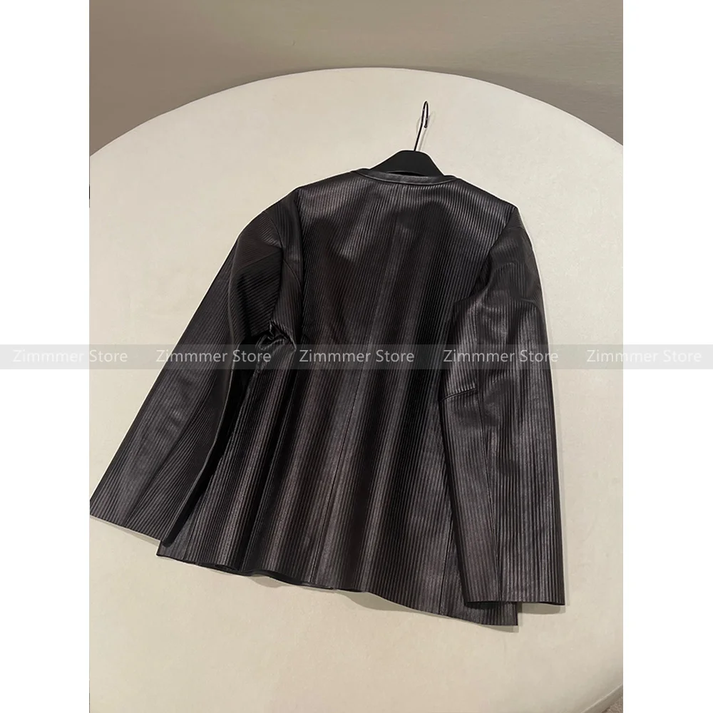 Fashion women's 2024 autumn and winter new black round neck three-dimensional embossed pleated loose leather jacket