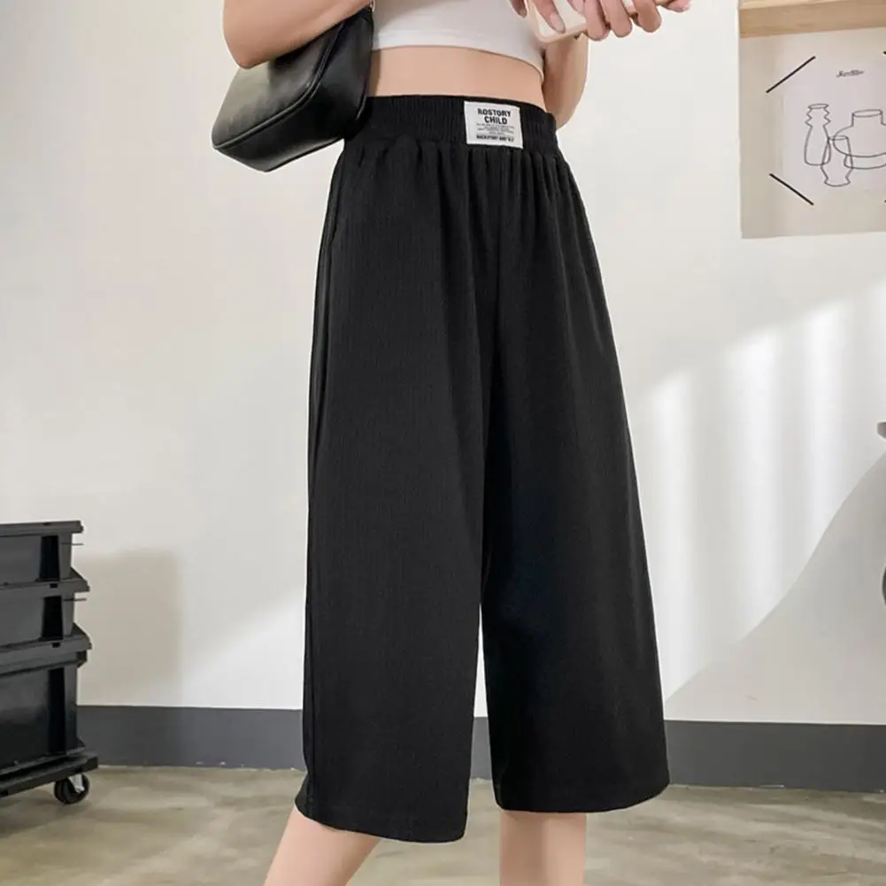 

Ice Silk Pants Streetwear Summer Ice Silk Cropped Pants with Elastic Waist Pockets Loose Fit Wide Leg Mid-calf Length Pants