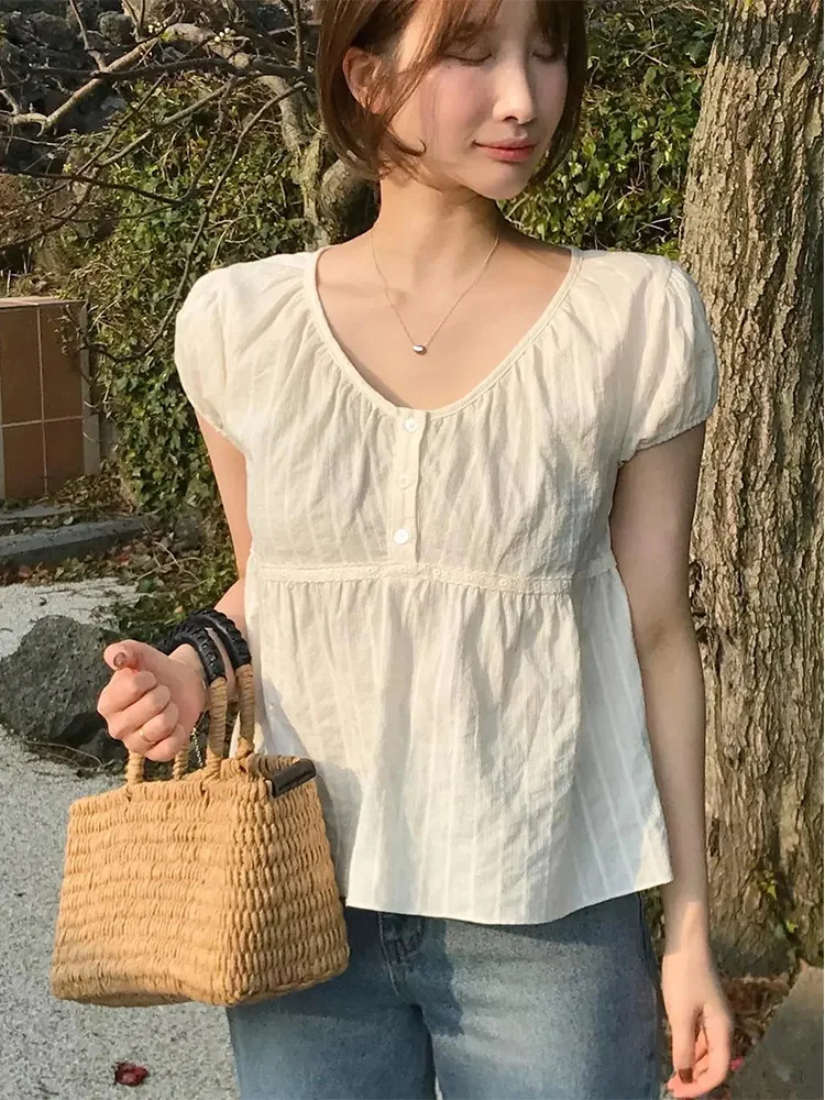 เสื้อทรงหลวมสไตล์เรโทรสำหรับผู้หญิง ดีไซน์ตุ๊กตา แนวฮันกีเซ ติดกระดุม ทรงกลม สีพื้น