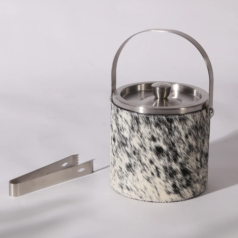 

custom metal beer bucket wrapped in black and white cow hair leather stainless steel ice bucket with lid and handle