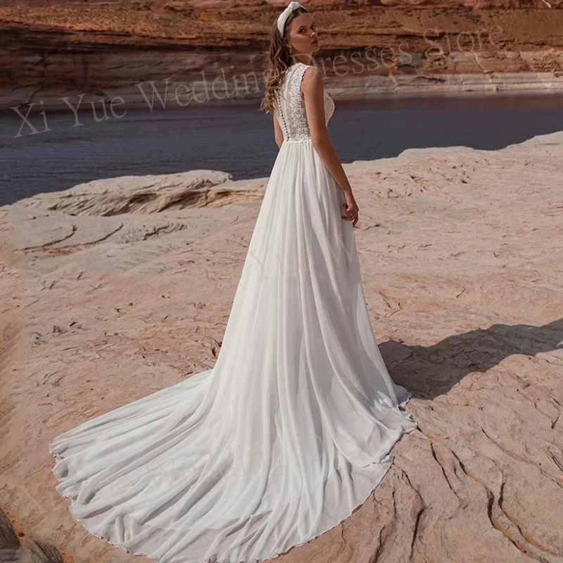 2025 Boho elegante O-cuello vestidos De novia una línea Apliques De encaje sin mangas vestidos De novia ilusión playa personalizado Vestido De novia