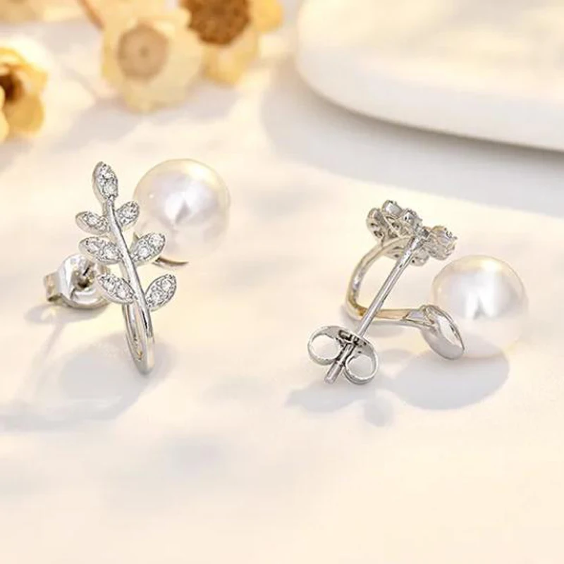 

Серьги-гвоздики женские из серебра 925 пробы с цирконом и жемчугом