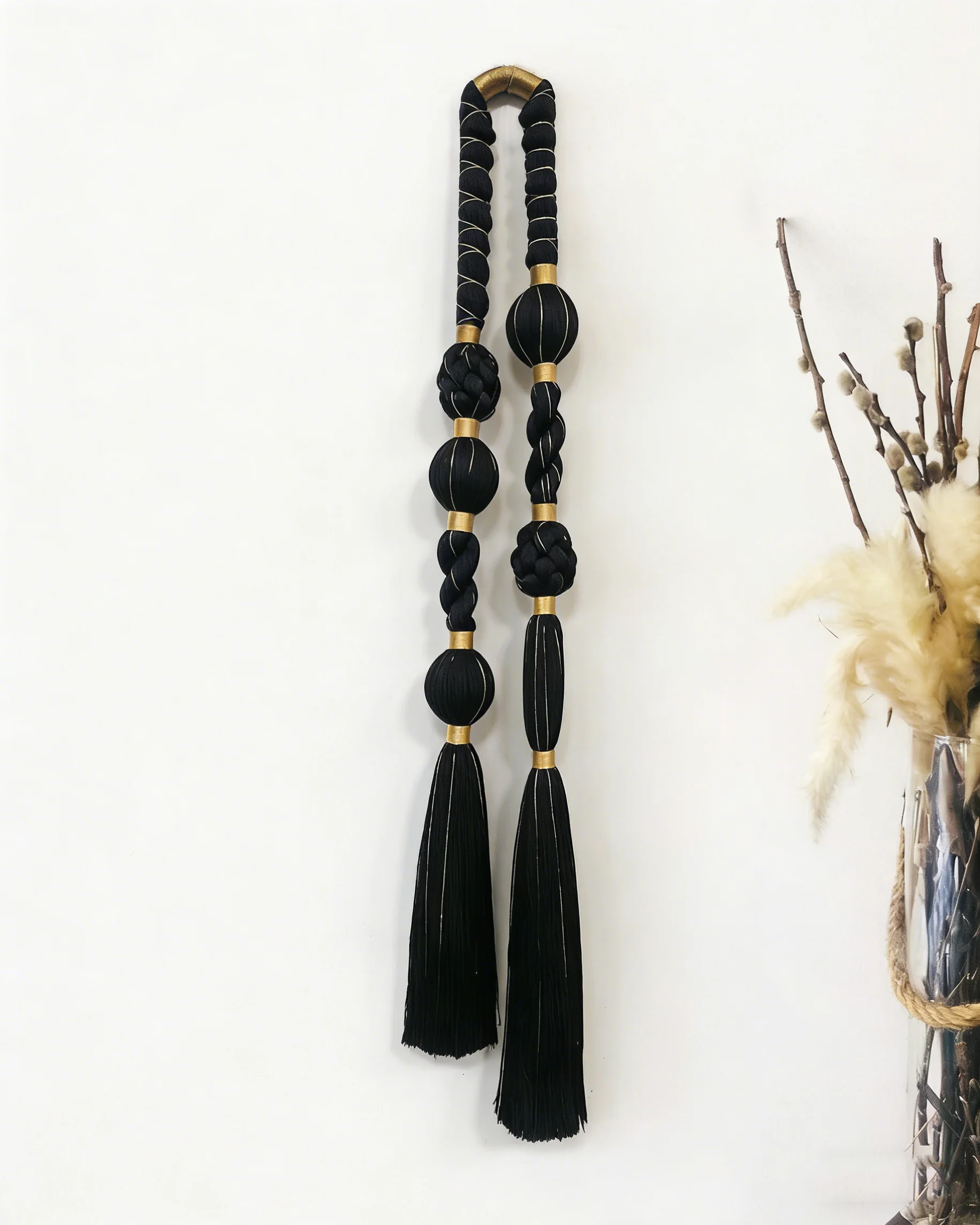 

Handmade Black Macrame Wall Hanging Twisted Rope Tassel Wall Art with Gold Accents Luxury Boho Woven Wall Decor for Modern Home