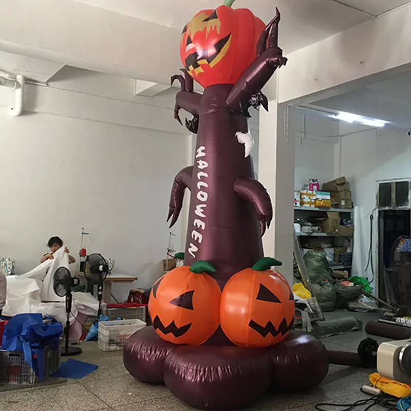 

Inflatable funny pumpkin tree with a pumpkin air mold. Halloween bar with terrifying atmosphere props can be customized with