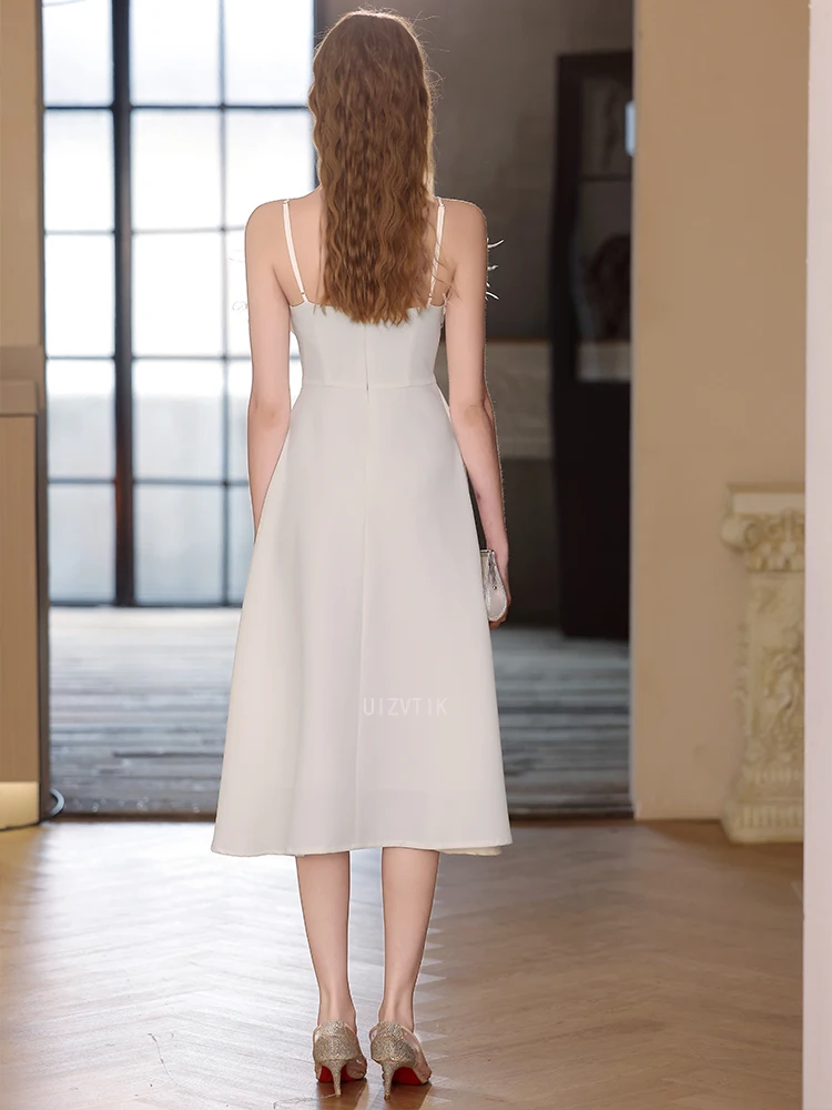 Robe de soirée d'anniversaire en Satin blanc pour femmes, élégante, avec coutures de plumes, col en v, dos nu, robe de bal Simple, robe de soirée de mariage