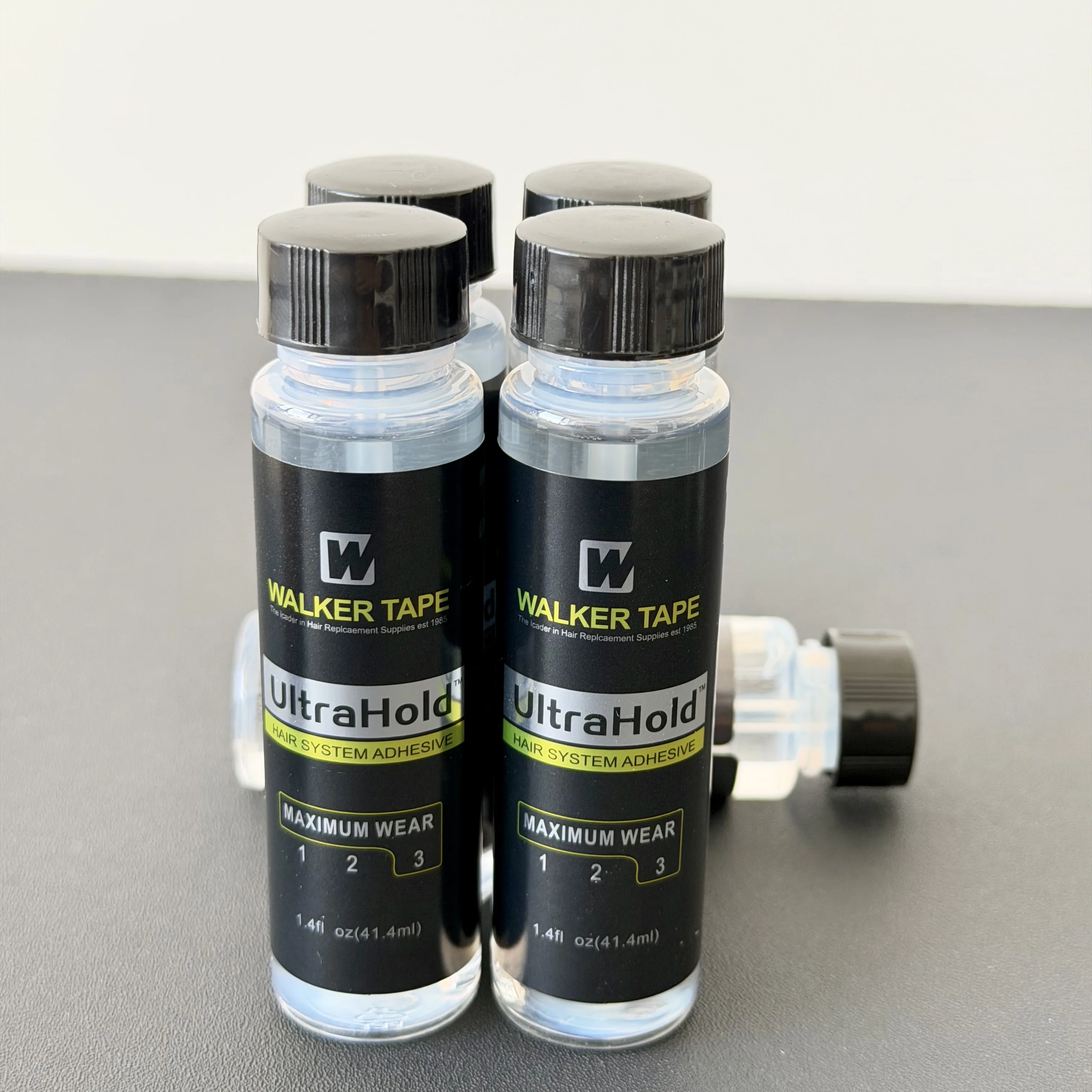 

Walker Tape UltraHold Hair System Adhesive 1.4oz/41.4ml Strong Hold Wig Glue for Toupee Hairpiece