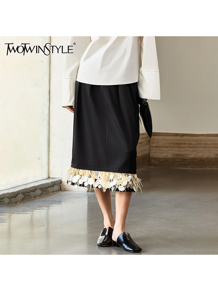 TWOTWINSTYLE Hit Color Loose Spliced Tassel Skirts For Women High Waist Temperament Minimalist Skirts Female Fashion Style New