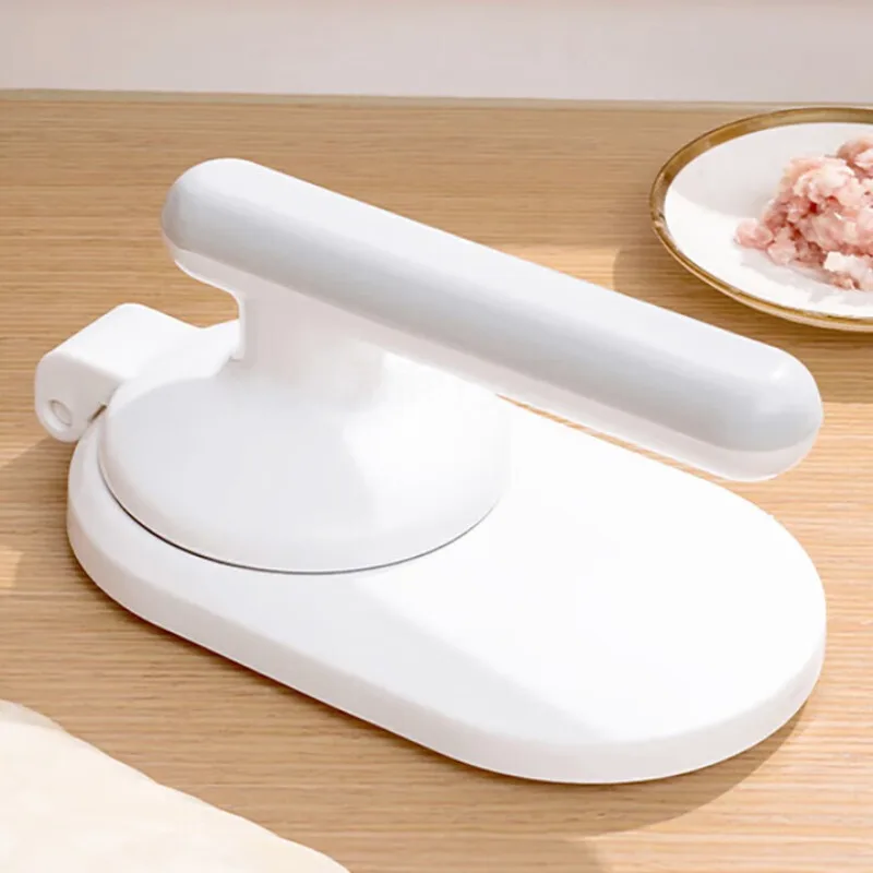 

Tools for pressing dumpling skins New household bag, bun mold, dumpling rolling dough, lazy manual leather press
