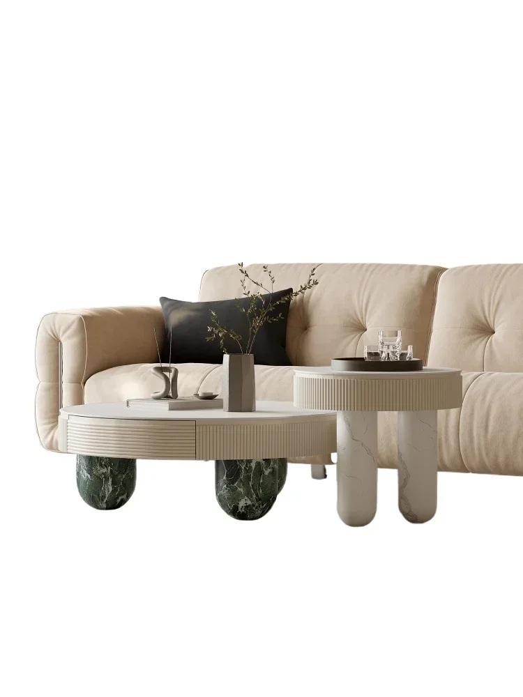 

Cream wind rock slab round coffee table high-end light luxury coffee table living room home