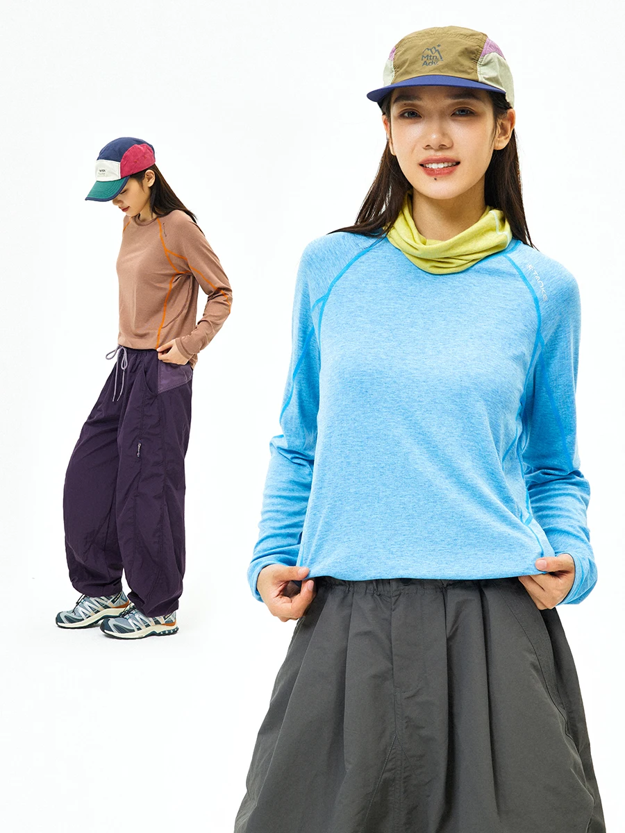 

Женская футболка с длинным рукавом для активного отдыха: охлаждающая, быстросохнущая, для походов, велоспорта, бега по горам. Комфортная, дышащая, легкая.