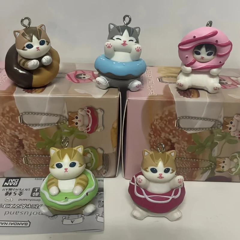 

Новинка в наличии: Подвеска-брелок Mofusand в форме пончика, коллекционная фигурка кота-едока, кавайный брелок-сюрприз для девочек