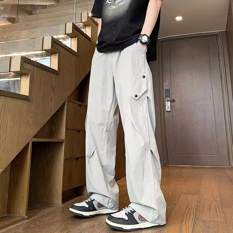 

Быстросохнущие рабочие брюки из ледяного шелка для мужчин, новинка 2023 года, модные брендовые летние тонкие стильные спортивные повседневные брюки десантника с зарядкой