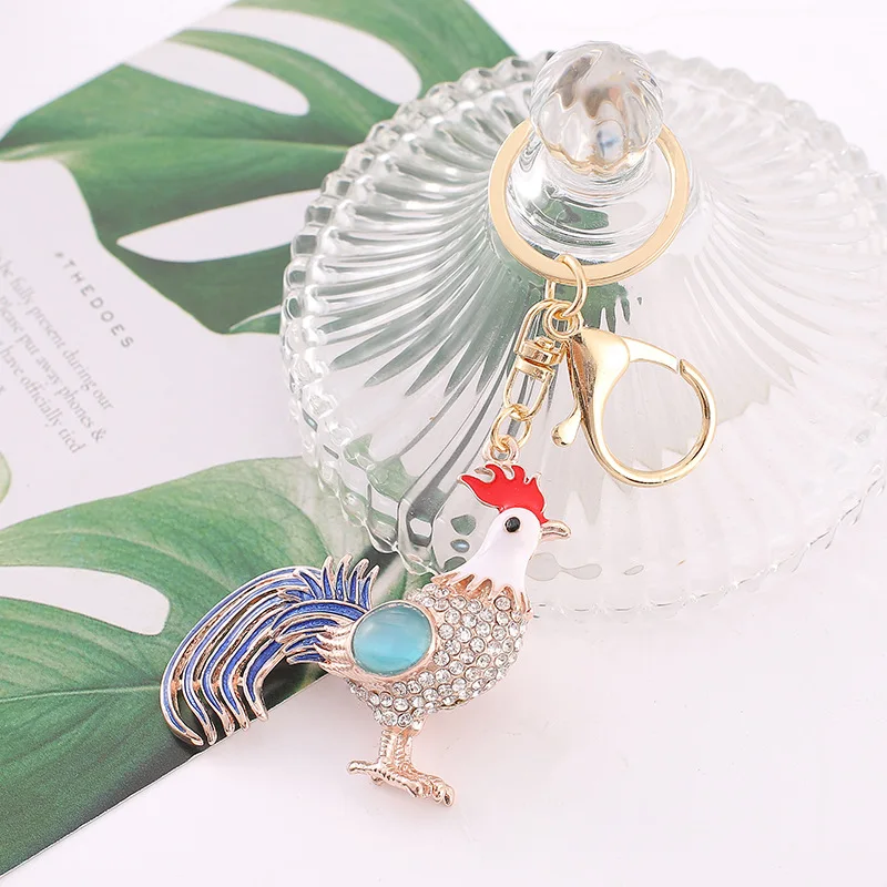 พวงกุญแจรูปตาแมวน่ารัก สีสันสดใส ประดับด้วยหิน ขนาดใหญ่ เหมาะสำหรับผู้หญิง ผู้ชาย พวงกุญแจรถยนต์ เครื่องประดับสำหรับงานปาร์ตี้ งานแต่งงาน ของขวัญสำหรับสาวๆ