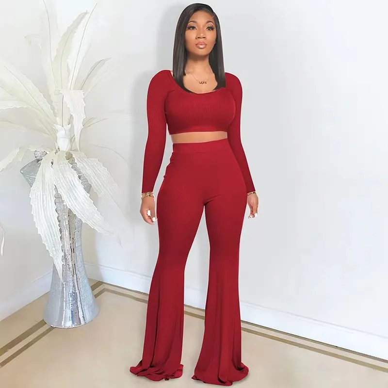 

Однотонный вязаный комплект из двух предметов для женской одежды, спортивная повседневная одежда для фитнеса, укороченный топ с длинными рукавами и брюки-клеш, одинаковые комплекты