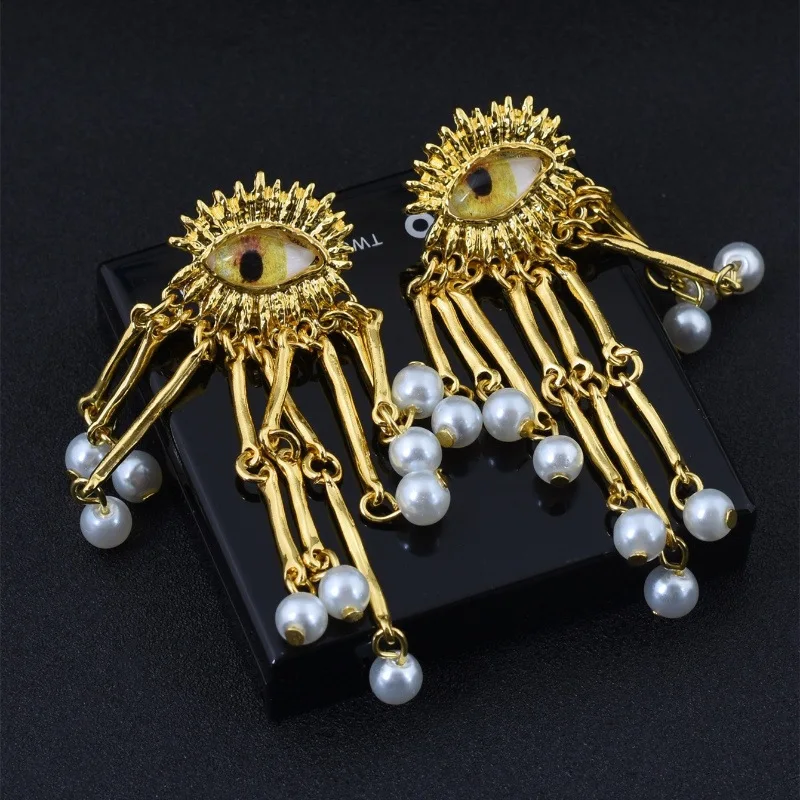 

European and American medieval accessories vintage eye tassels light luxury high-end earrings French fashion devil eye earrings