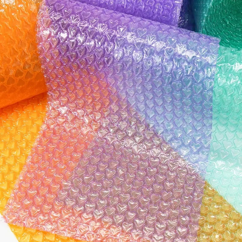 Rotolo di avvolgimento a bolle di cuore per imballaggio tampone da 0,2 * 5 m per l'imballaggio di sacchetti per avvolgere tamponi in schiuma per avvolgere bolle di carta a bolle